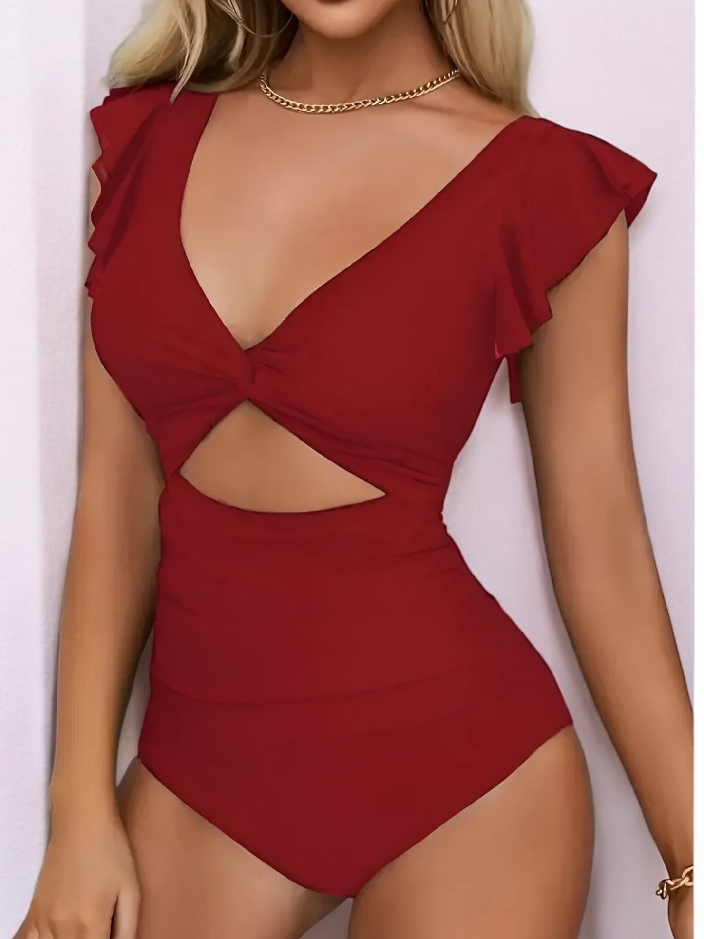 Maillot de bain une pièce noir femme – décolleté plongeant & volants Linoa
